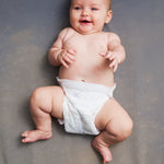 Newborn baby in Lovekins TriplePro Bio nappy