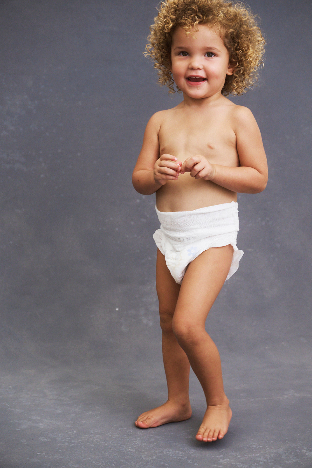 Toddler standing in Lovekins TriplePro Bio nappy