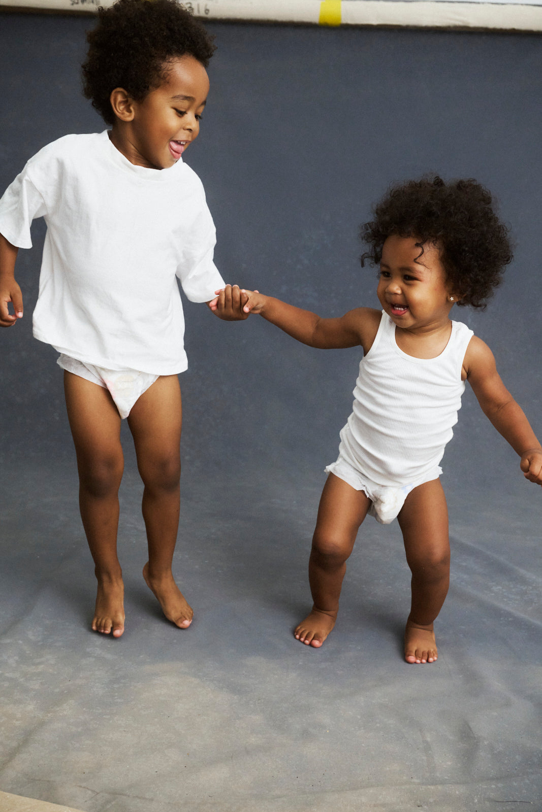 Walking toddlers in Lovekins TriplePro Bio nappy pants
