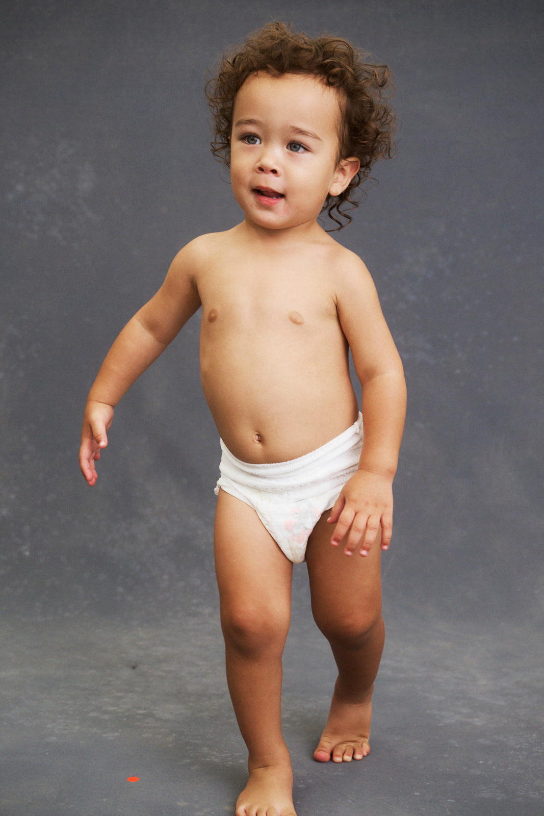 Walking toddler in Lovekins TriplePro Bio nappy pants