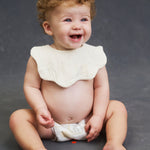 Infant sitting up in Lovekins TriplePro Bio nappy