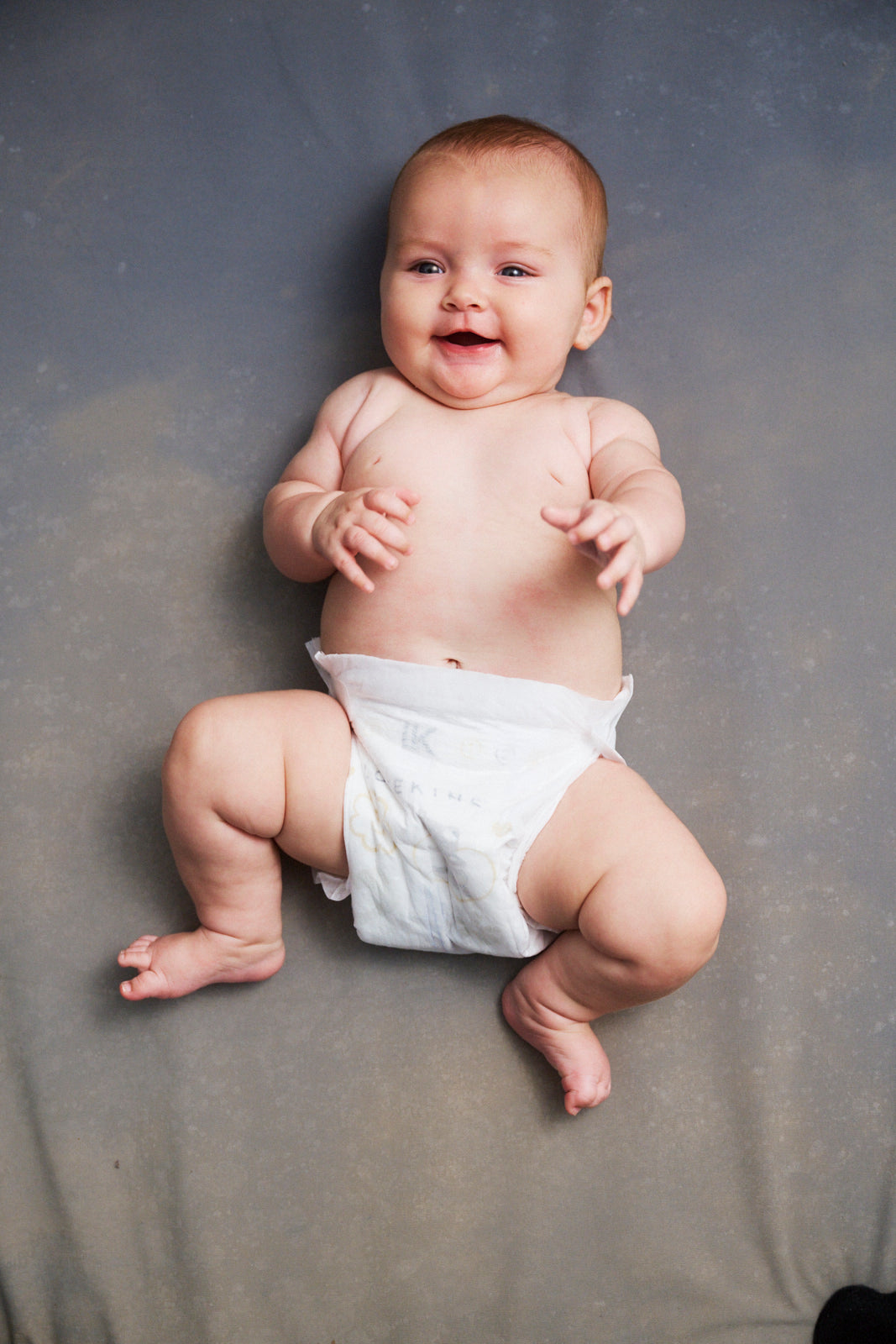 Newborn baby in Lovekins TriplePro Bio nappy